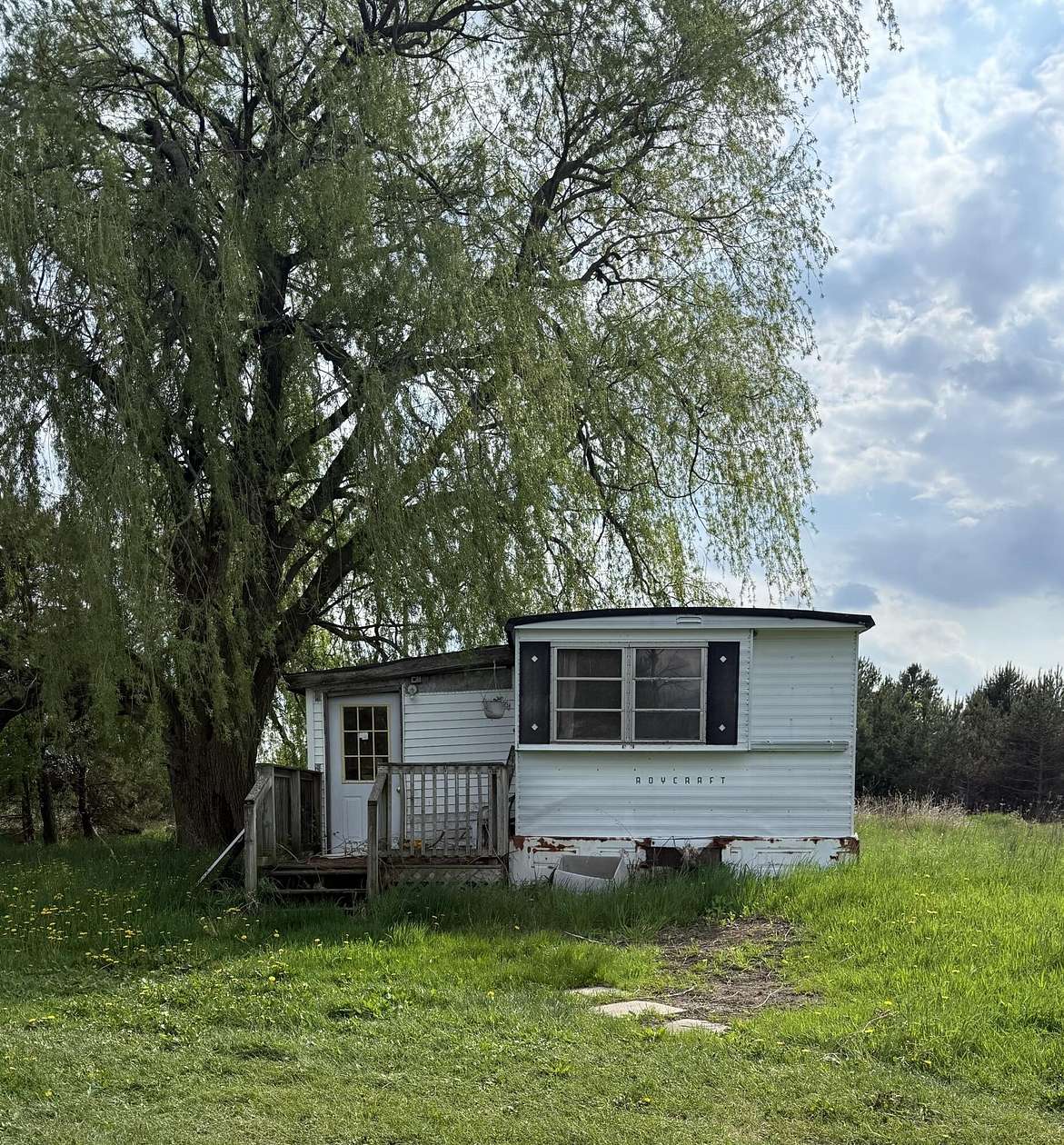 2 Acres of Residential Land with Home for Sale in Evart, Michigan