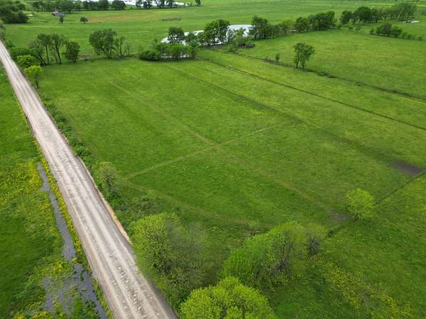 10 Acres of Land for Sale in Gravette, Arkansas
