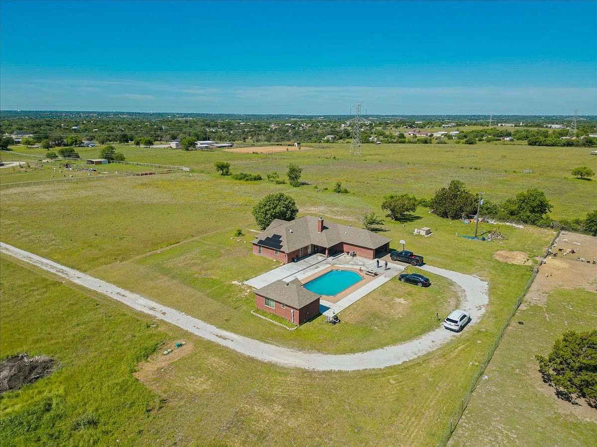 29.3 Acres of Agricultural Land with Home for Sale in Weatherford, Texas
