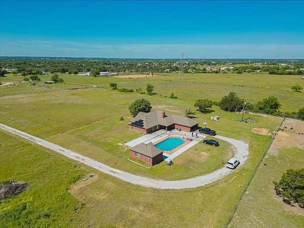 29.3 Acres of Agricultural Land with Home for Sale in Weatherford, Texas