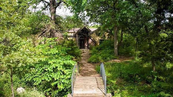 1.65 Acres of Residential Land with Home for Sale in Oak Point, Texas