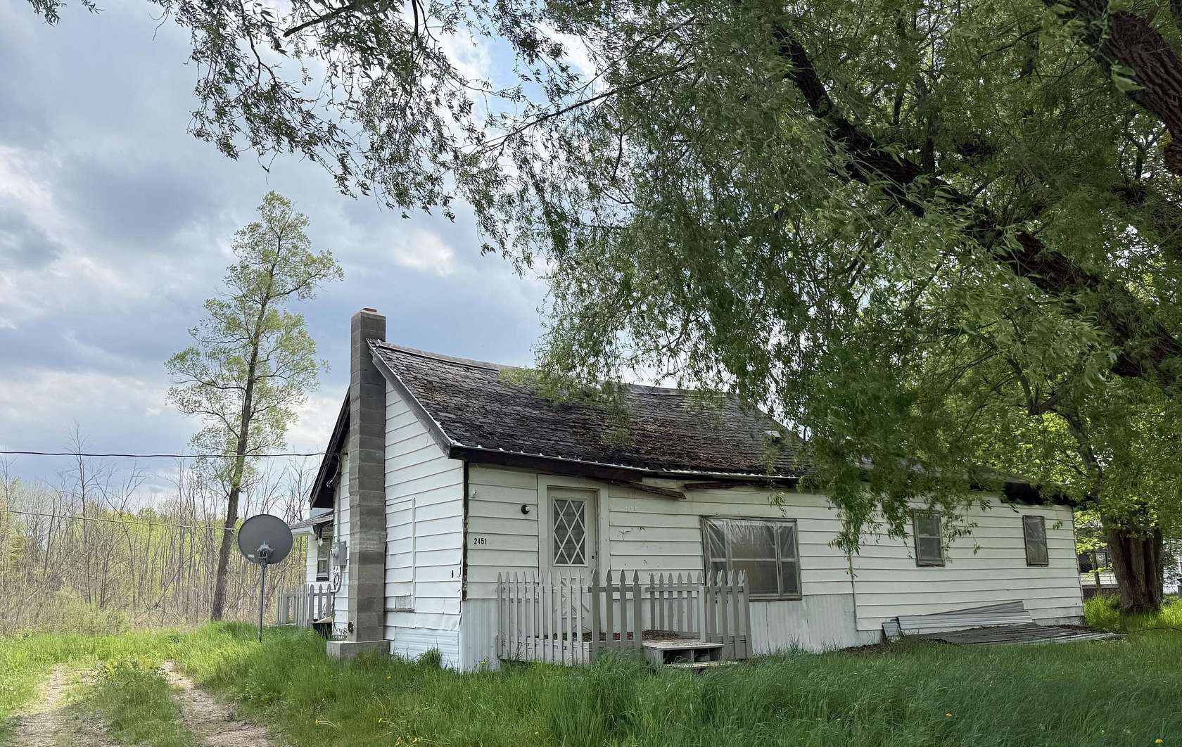 2.5 Acres of Residential Land with Home for Sale in Sears, Michigan