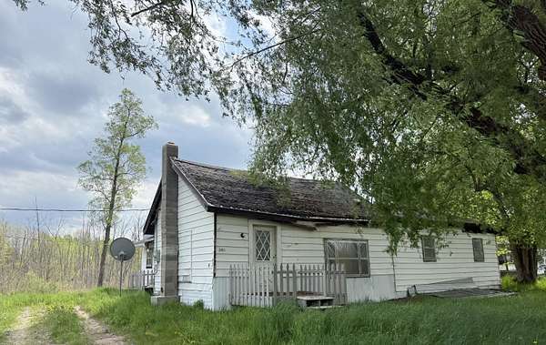 2.5 Acres of Residential Land with Home for Sale in Sears, Michigan
