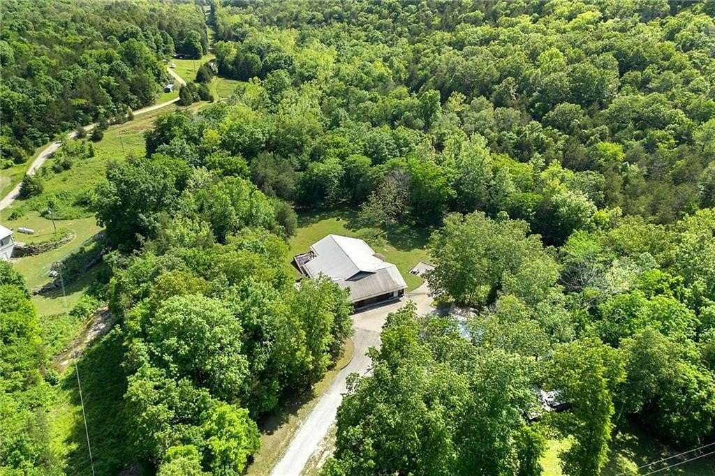 10 Acres of Land with Home for Sale in Marble Falls Township, Arkansas