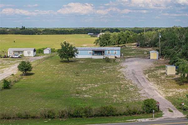 2.64 Acres of Residential Land with Home for Sale in Babson Park, Florida