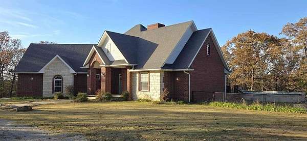 5 Acres of Residential Land with Home for Sale in Holdenville, Oklahoma