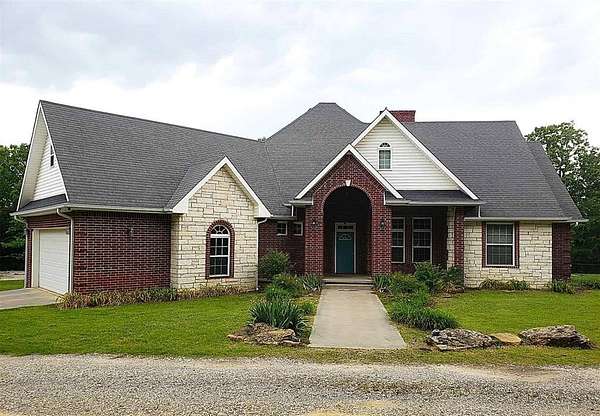 5 Acres of Residential Land with Home for Sale in Holdenville, Oklahoma