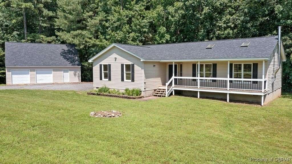 5.12 Acres of Land with Home for Sale in Saluda, Virginia