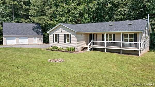 5.12 Acres of Land with Home for Sale in Saluda, Virginia