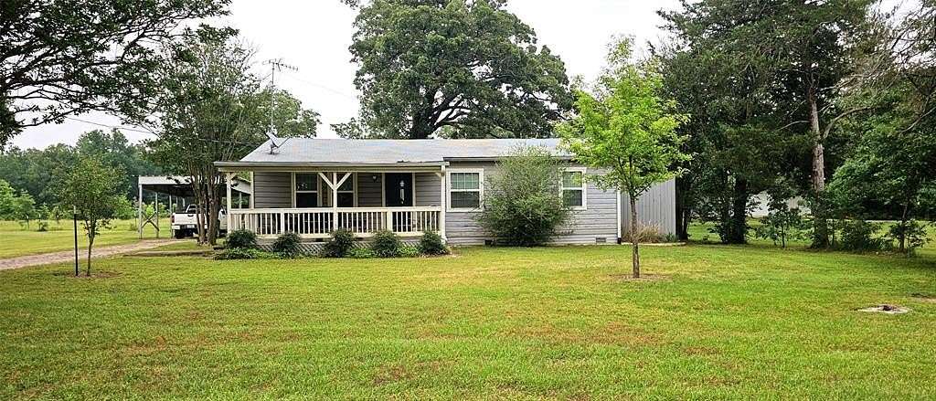 57.3 Acres of Land with Home for Sale in Hagansport, Texas