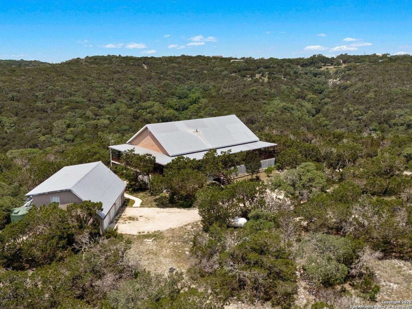 19 Acres of Land with Home for Sale in Pipe Creek, Texas