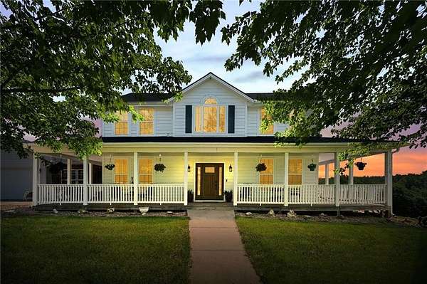 5 Acres of Residential Land with Home for Sale in Grain Valley, Missouri