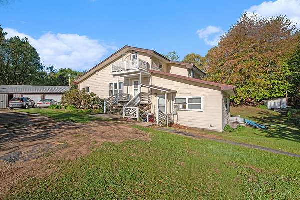 6 Acres of Residential Land with Home for Sale in Rockford, Michigan