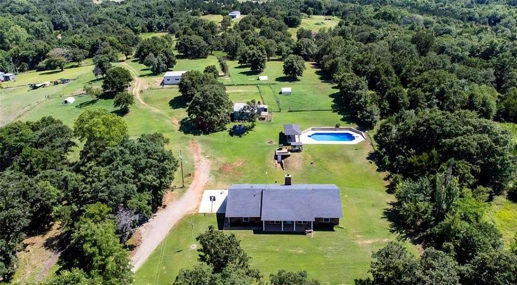 25.2 Acres of Agricultural Land with Home for Sale in Wellston, Oklahoma