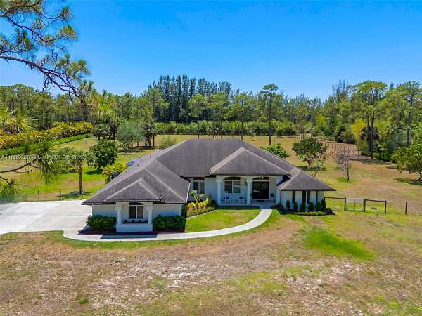 5 Acres of Residential Land with Home for Sale in Palm Beach Gardens, Florida