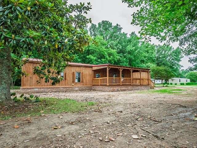 3.3 Acres of Residential Land with Home for Sale in Batesville, Mississippi