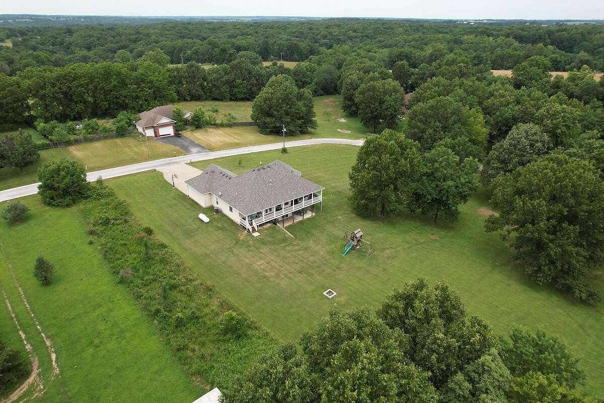 2.1 Acres of Residential Land with Home for Sale in Nixa, Missouri