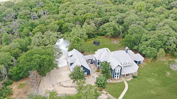 3.34 Acres of Land with Home for Sale in Cross Roads, Texas