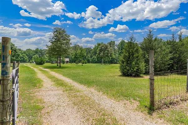 1.79 Acres of Residential Land with Home for Sale in Benton, Louisiana