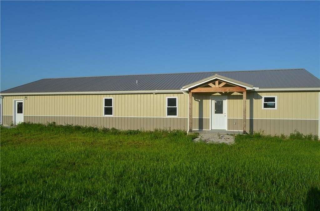 11.2 Acres of Land with Home for Sale in Holden, Missouri