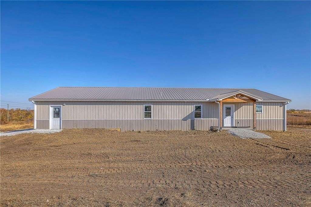 11.2 Acres of Land with Home for Sale in Holden, Missouri