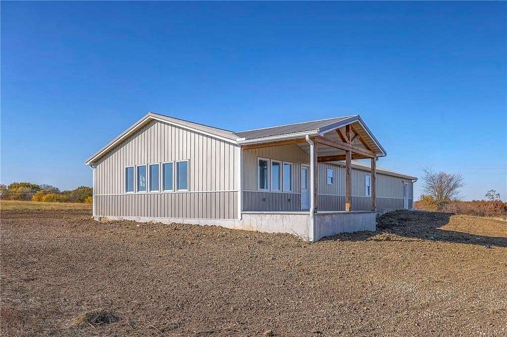 11.2 Acres of Land with Home for Sale in Holden, Missouri