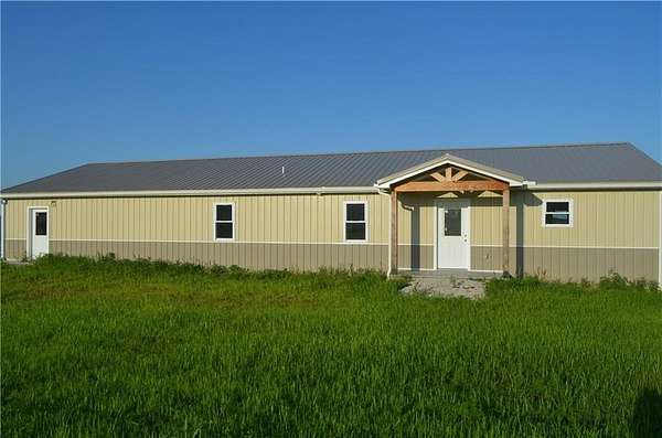 11.2 Acres of Land with Home for Sale in Holden, Missouri