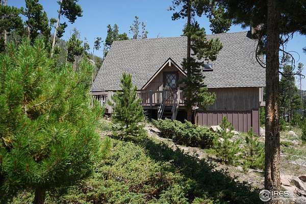 2 Acres of Residential Land with Home for Sale in Red Feather Lakes, Colorado