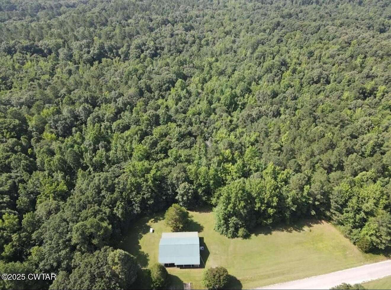 34.8 Acres of Recreational Land with Home for Sale in Buena Vista, Tennessee