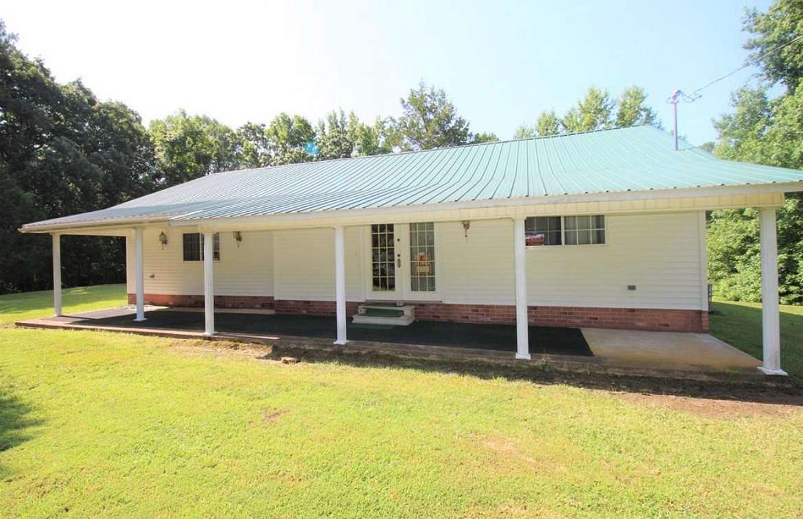 5 Acres of Land with Home for Sale in Buena Vista, Tennessee