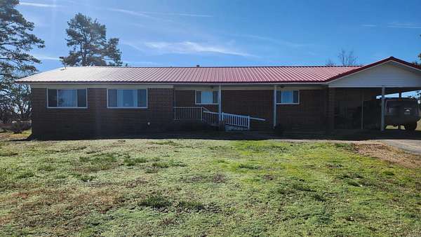 1.54 Acres of Residential Land with Home for Sale in Norman, Arkansas