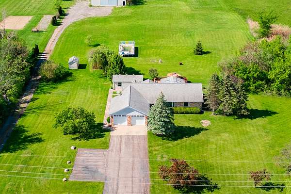 4.18 Acres of Residential Land with Home for Sale in Flat Rock, Michigan
