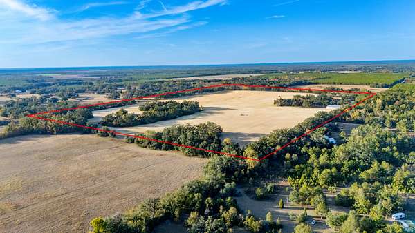 110 Acres of Agricultural Land with Home for Sale in Live Oak, Florida