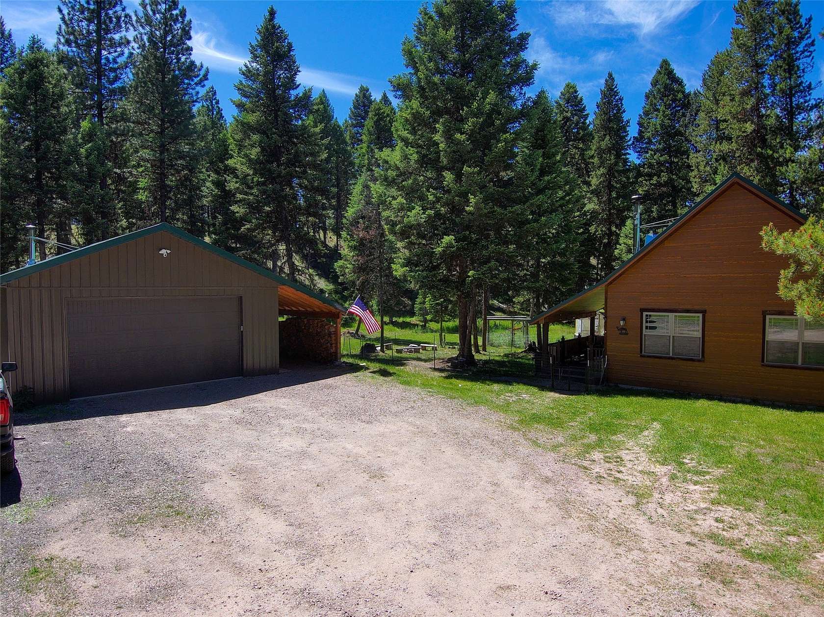2.85 Acres of Residential Land with Home for Sale in Seeley Lake, Montana
