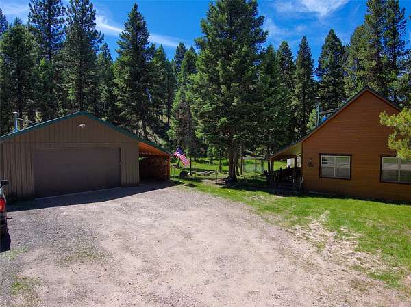 2.85 Acres of Residential Land with Home for Sale in Seeley Lake, Montana