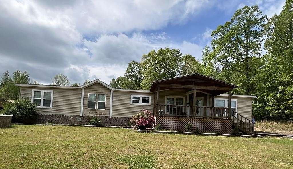 5.5 Acres of Residential Land with Home for Sale in Pope, Mississippi