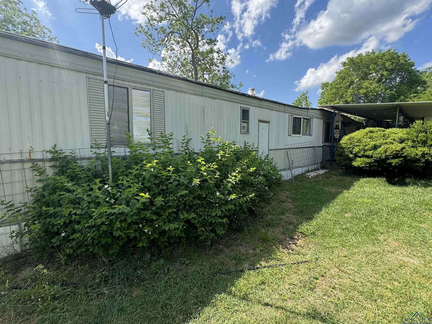 2 Acres of Residential Land with Home for Sale in Gladewater, Texas