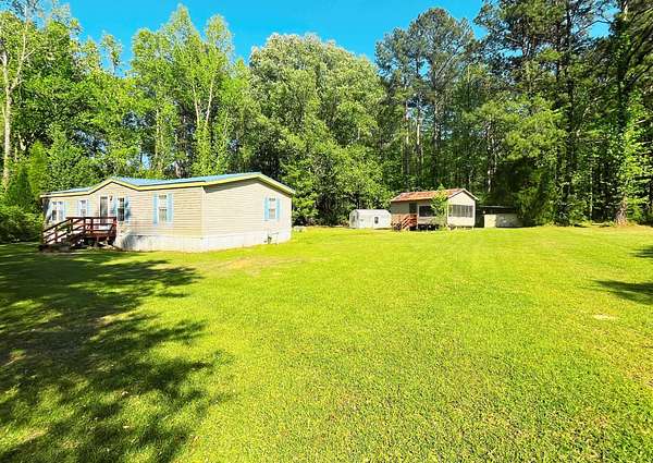 2.1 Acres of Residential Land with Home for Sale in Moncks Corner, South Carolina