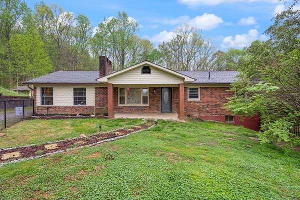 3.6 Acres of Residential Land with Home for Sale in Stearns, Kentucky