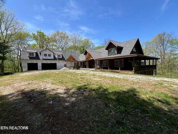 8.29 Acres of Residential Land with Home for Sale in Oneida, Tennessee