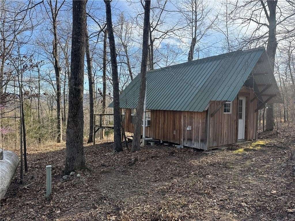 10 Acres of Residential Land with Home for Sale in Marble Falls Township, Arkansas