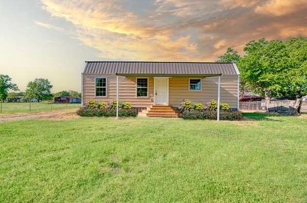 0.52 Acres of Residential Land with Home for Sale in Blossom, Texas