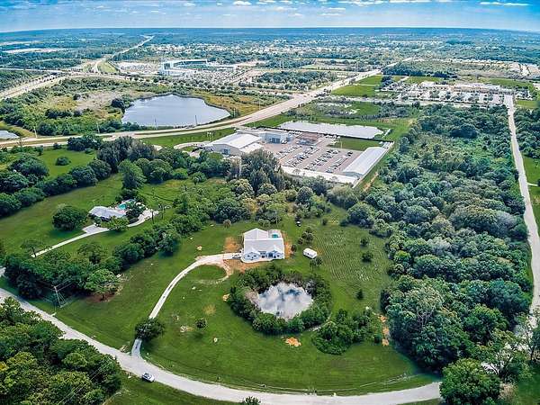 5.54 Acres of Residential Land with Home for Sale in Nokomis, Florida