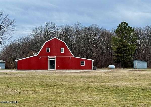10 Acres of Residential Land with Home for Sale in Seneca, Missouri