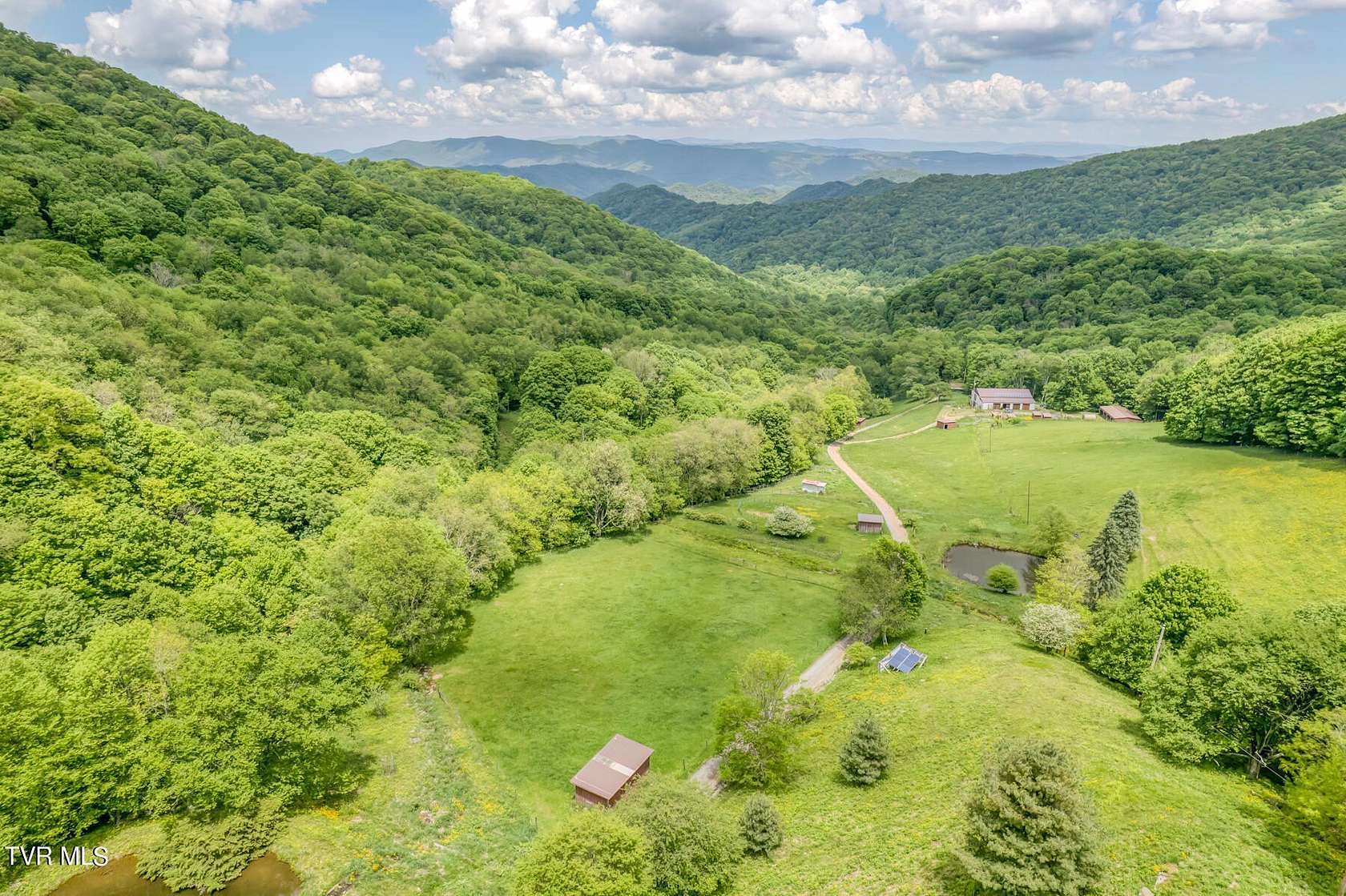 83.7 Acres of Land with Home for Sale in Roan Mountain, Tennessee