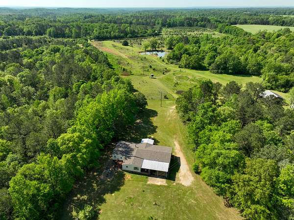 220 Acres of Land with Home for Sale in Autaugaville, Alabama