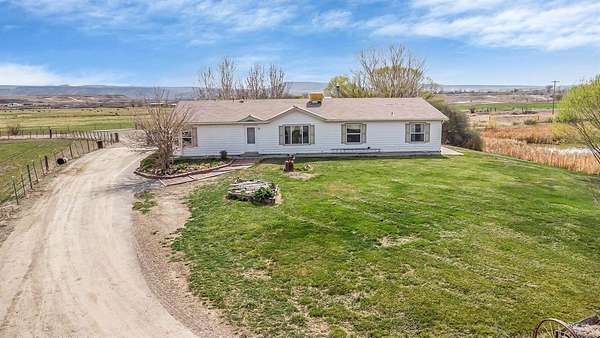 40 Acres of Agricultural Land with Home for Sale in Mack, Colorado
