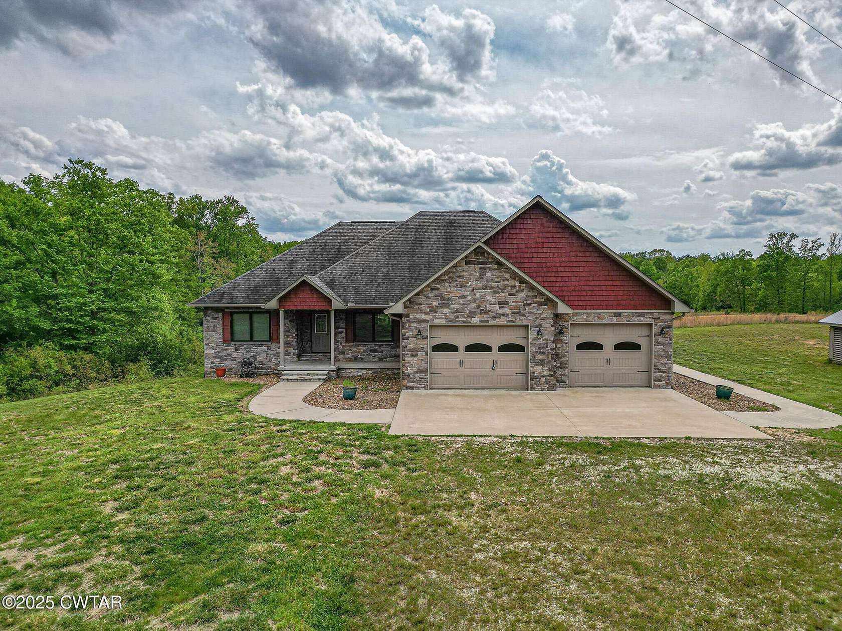 56 Acres of Land with Home for Sale in Hollow Rock, Tennessee