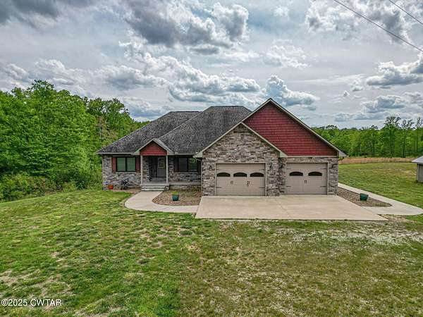 56 Acres of Land with Home for Sale in Hollow Rock, Tennessee