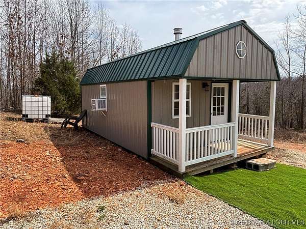 5.22 Acres of Residential Land with Home for Sale in Stover, Missouri